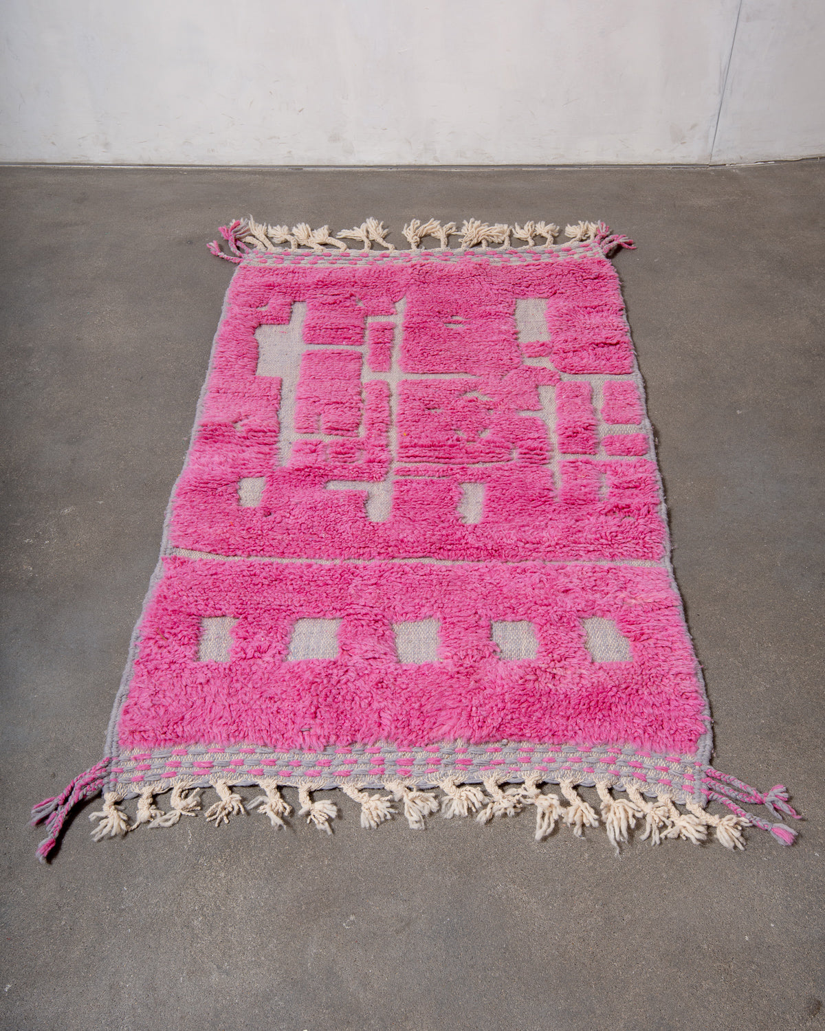 Modern, designer, handcrafted Berber rug from Morocco. Beniourain carpet with beautiful colours and patterns and fluffy wool texture.